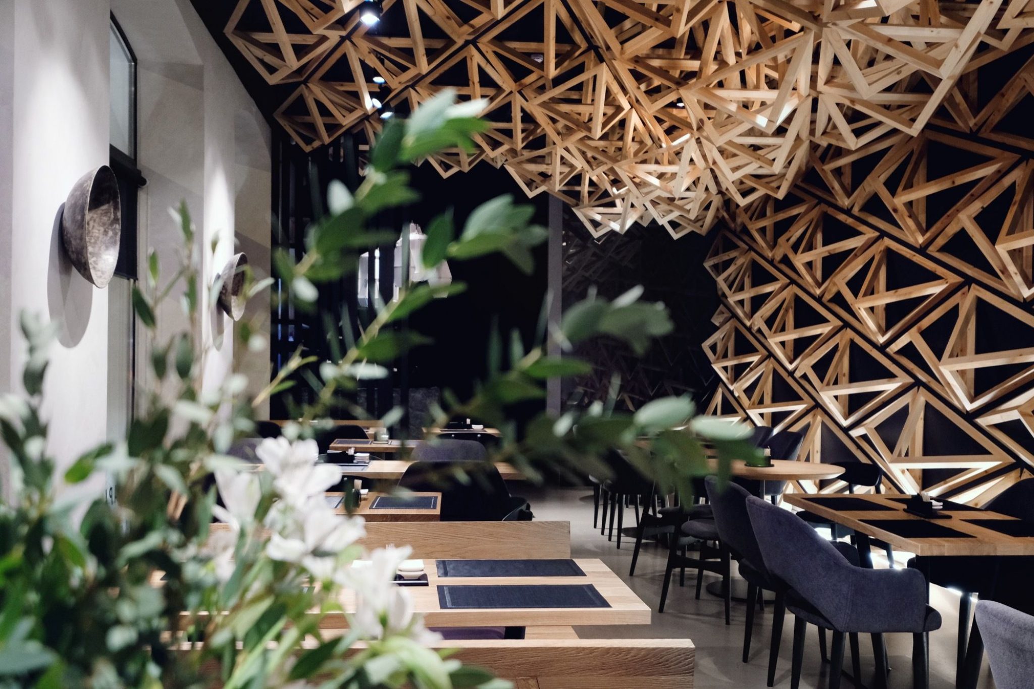 Wooden Triangles Dominate the Neutral Interior of Kido Sushi Bar by DA