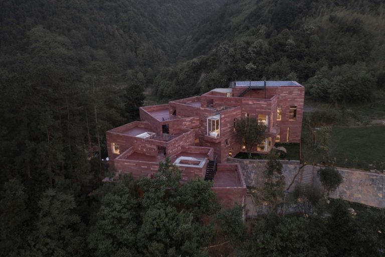 River Flows in Mountain Red House | SU Architects