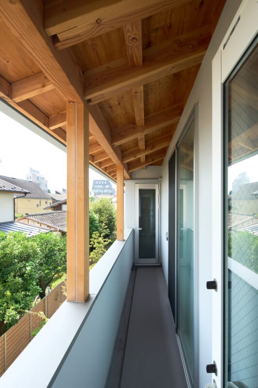 Two Large Roofs Leaning Together