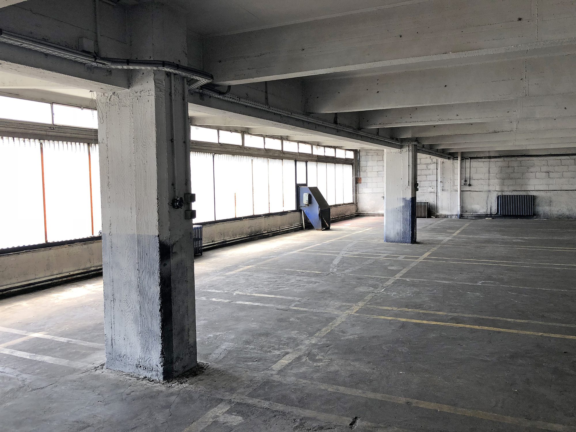 Garage Building into 63 Apartment Building