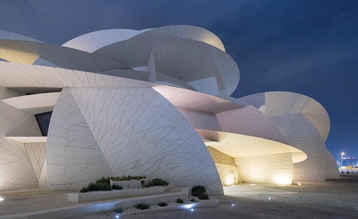 National Museum of Qatar in Doha by Jean Nouvel, its interlocking sand-coloured discs forming a desert rose structure, photographed by Iwan Baan