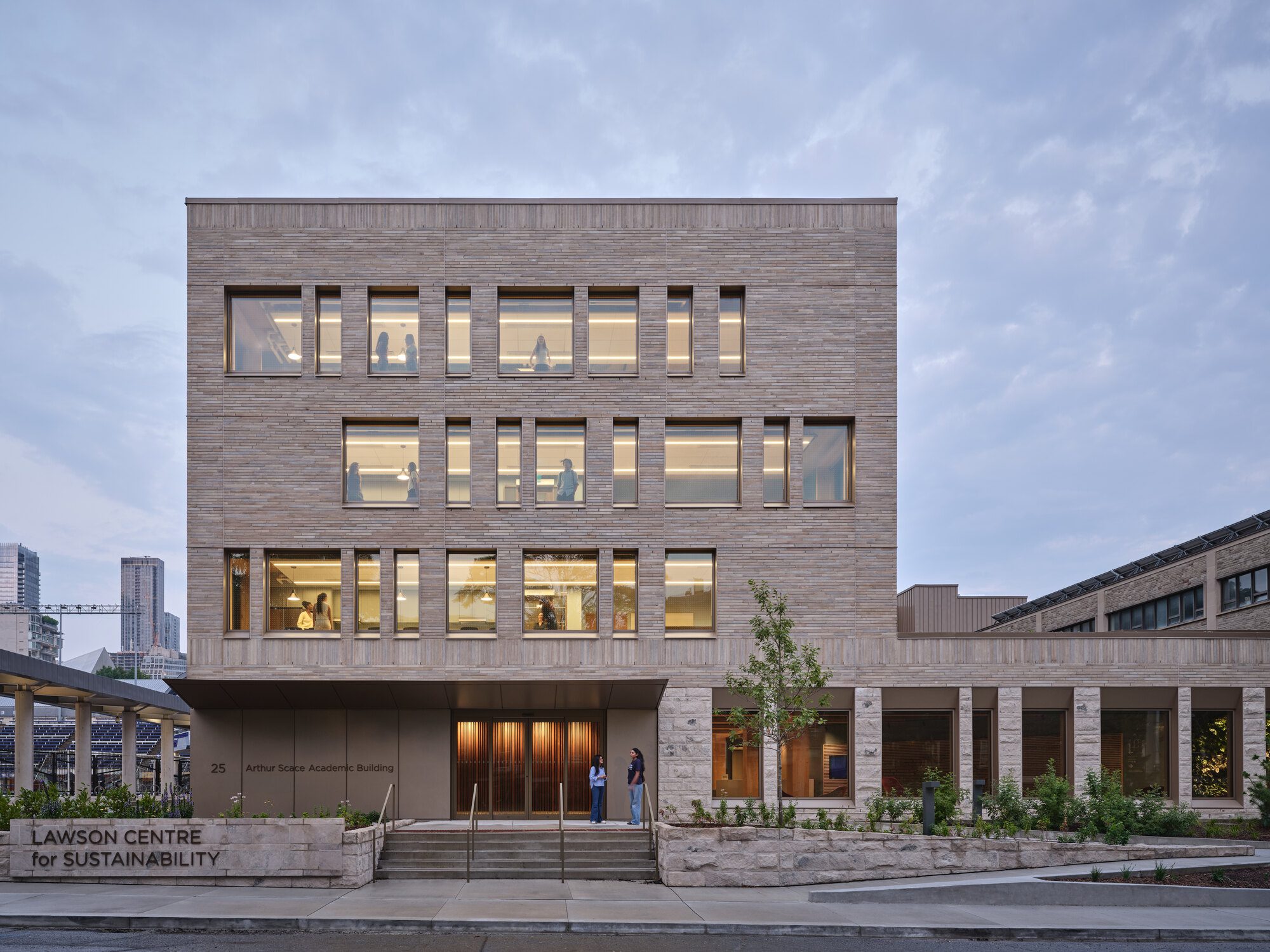 Landscaped courtyard planted with pollinator and drought-tolerant indigenous species around the building