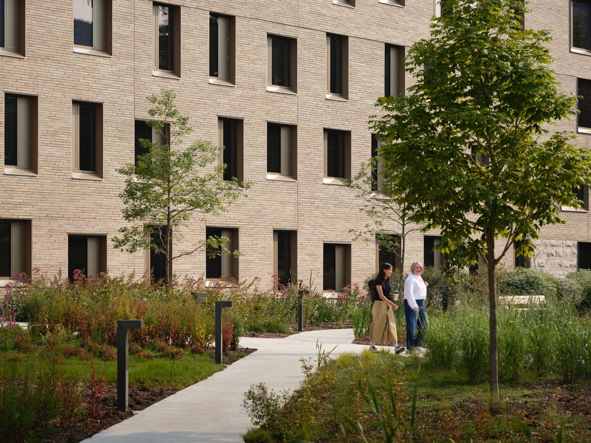 Communal residence lounge with a kitchen where students gather to share meals