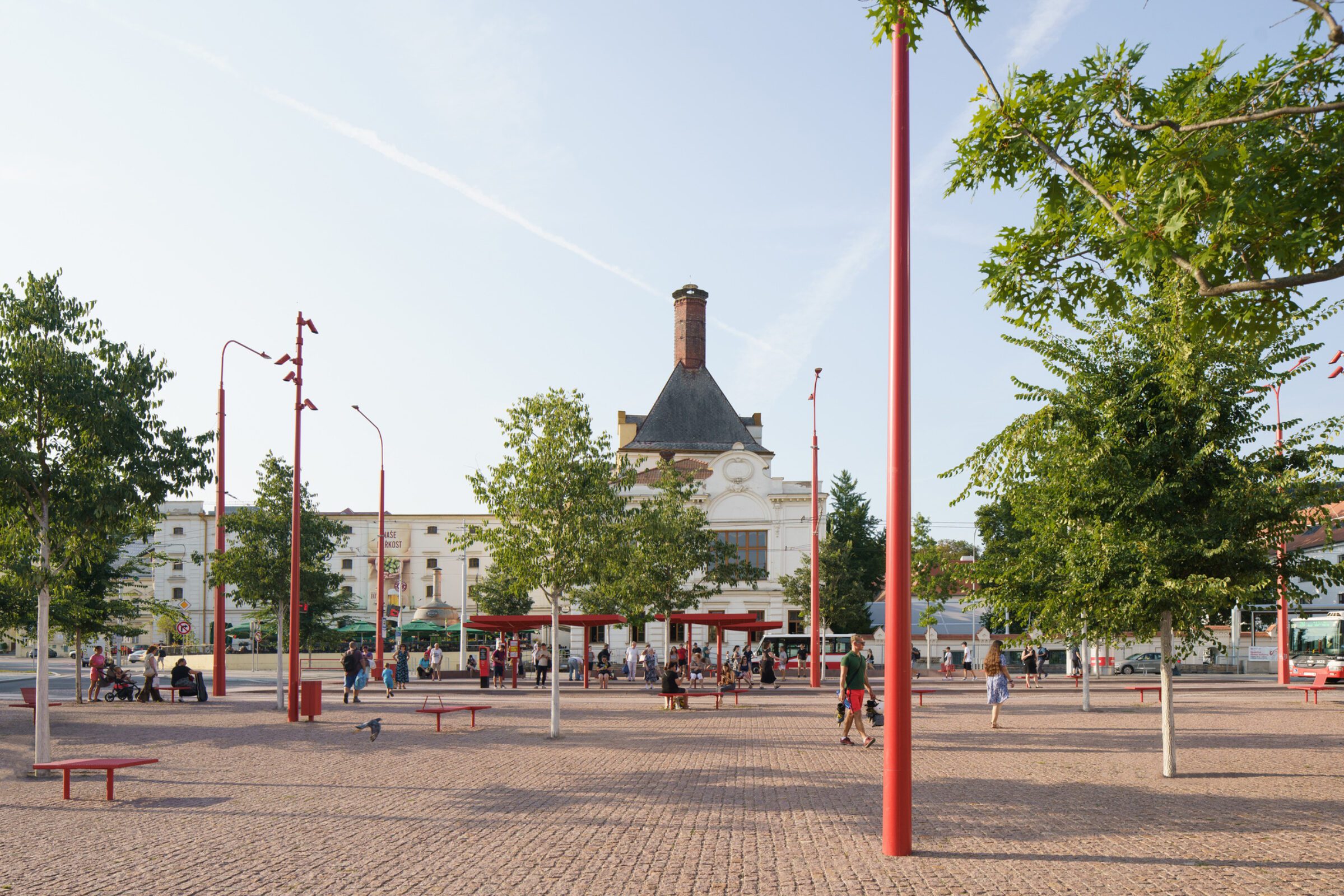 Mendel Square by CHYBÍK + KRIŠTOF, a public space with surrounding buildings and paving