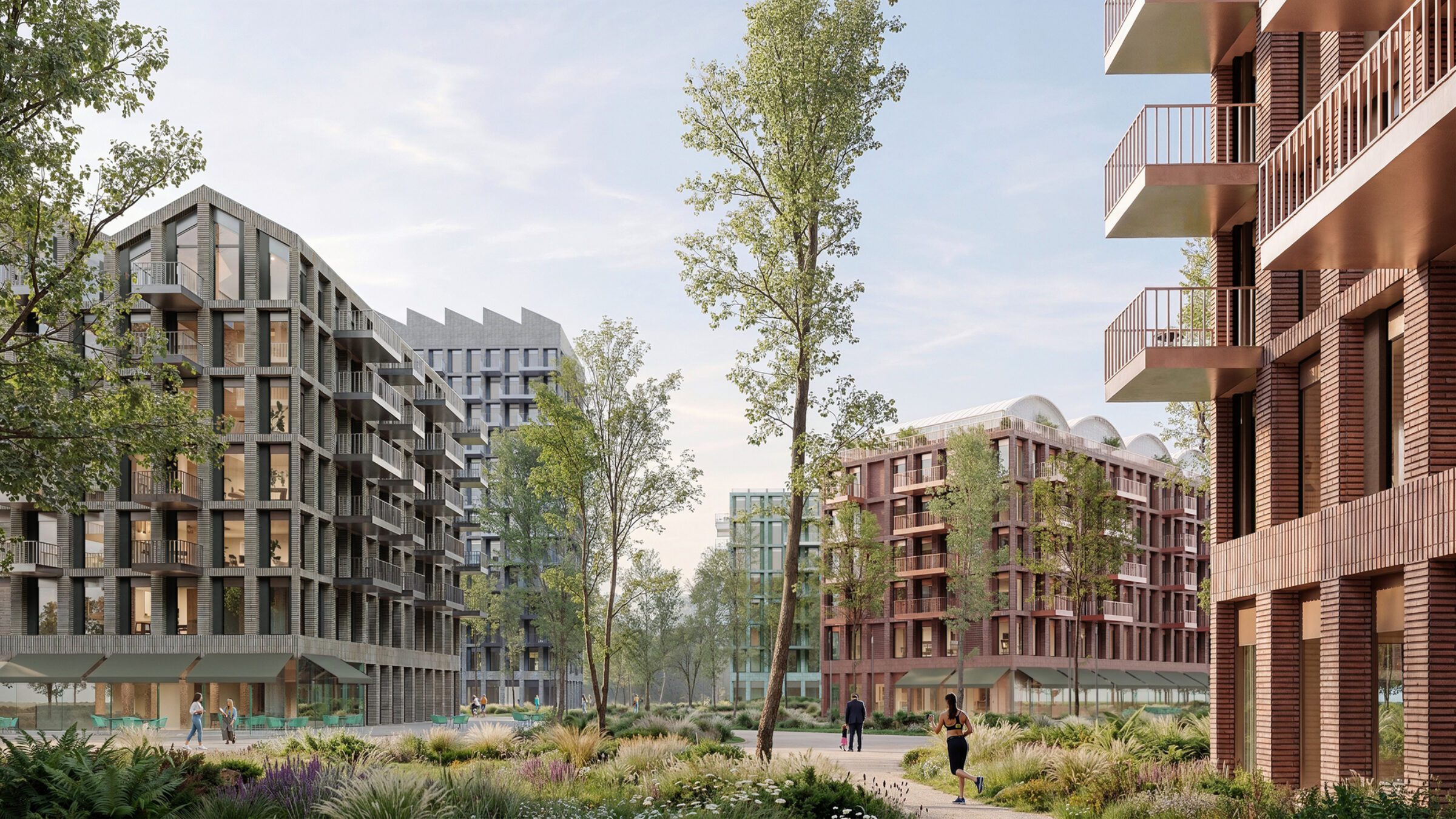 Loco Park rooftops with greenhouses, terraces and photovoltaic systems shaped like factory silhouettes