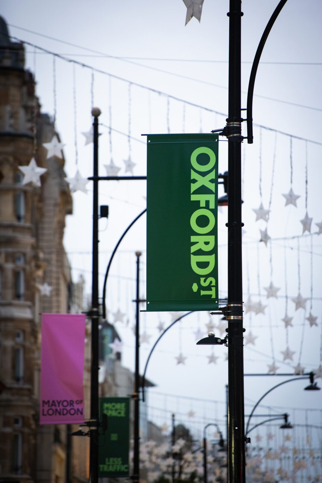 Large potted trees and seating on the pedestrianized section of Oxford Street