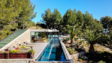 Watch Video of Airbnb’s 90-ft Aquarium Pool Villa